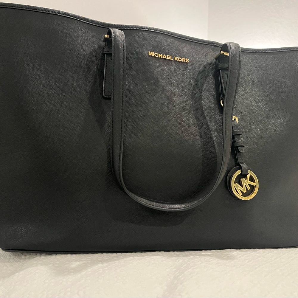 Michael Kors Black traveler bag